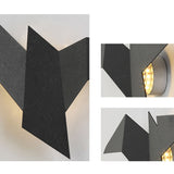 Kreative Wandleuchte aus Eisen in Vogelform