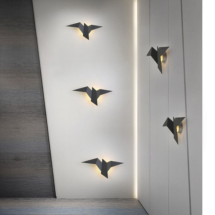 Kreative Wandleuchte aus Eisen in Vogelform