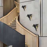 Kreative Wandleuchte aus Eisen in Vogelform