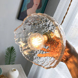 Unregelmäßige Hängelampe aus Messingglas
