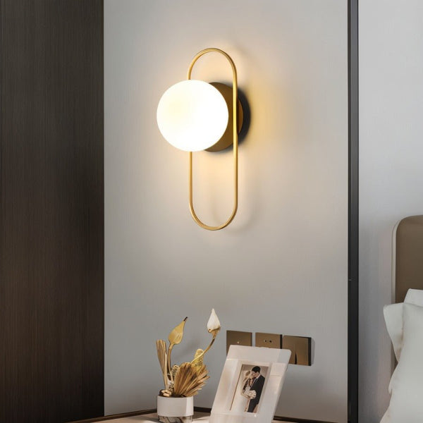 Wandleuchte für das Schlafzimmer aus Metall und Glas