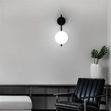 Wandleuchte für das Schlafzimmer aus Metall und Glas
