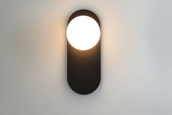 Wandleuchte für das Schlafzimmer aus Metall und Glas